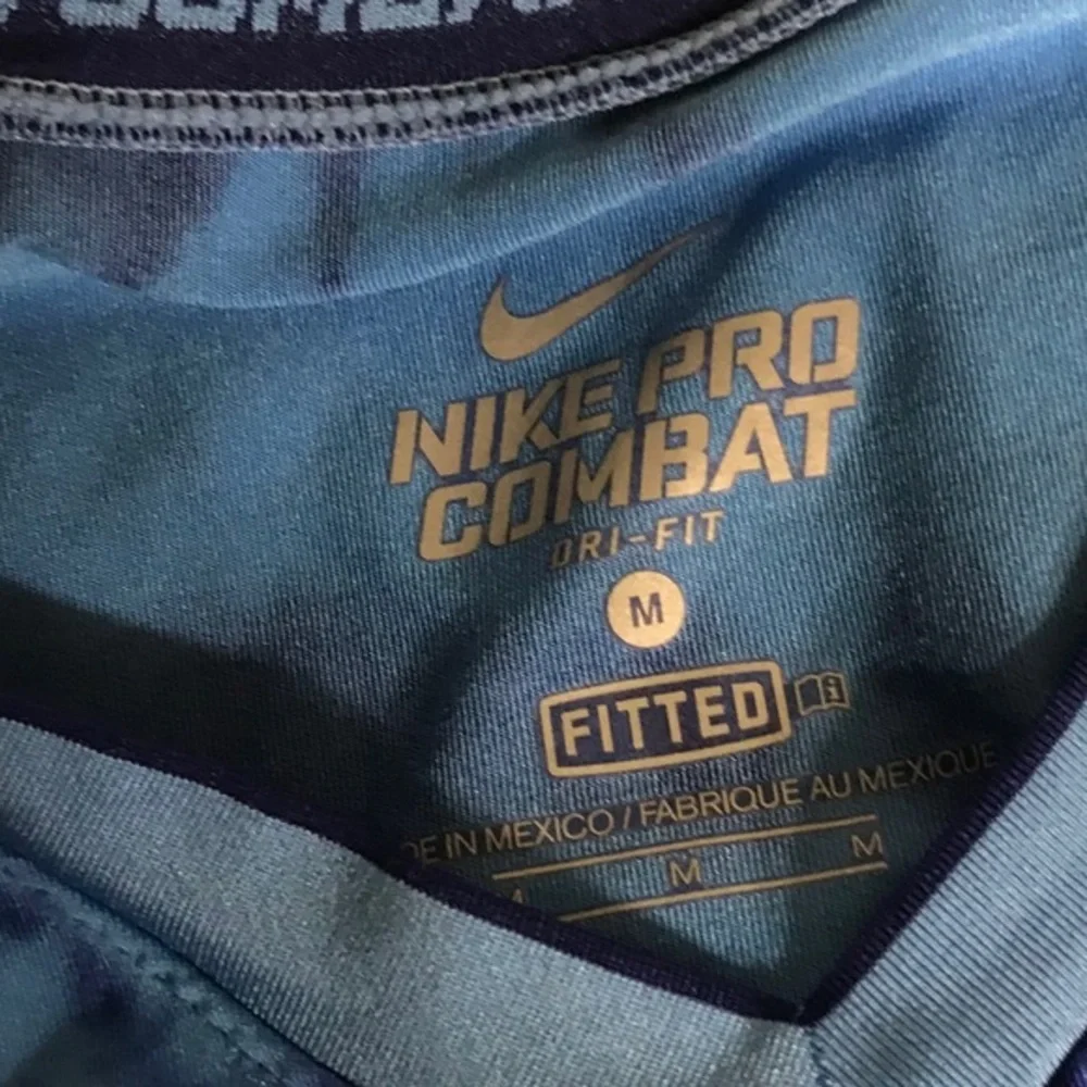 Nike dri fit tie die short sleeve blue shi…